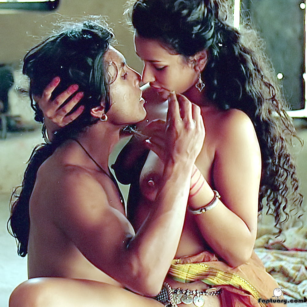 Indira Varma nude and showing her big boobs while riding a guy