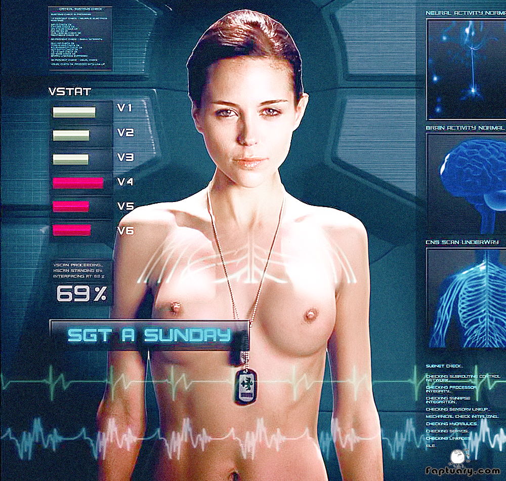 Tanya van Graan naked while being medically scanned for a military mecha suit