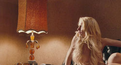 Lindsay Lohan nude with hair covering her boobs but nipples visible in Machete